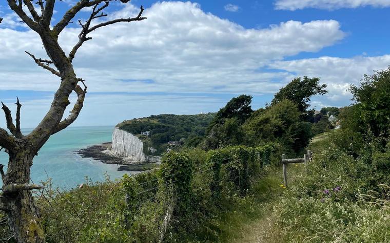 A clifftop path above the white cliffs and the sea on the Kent coast
